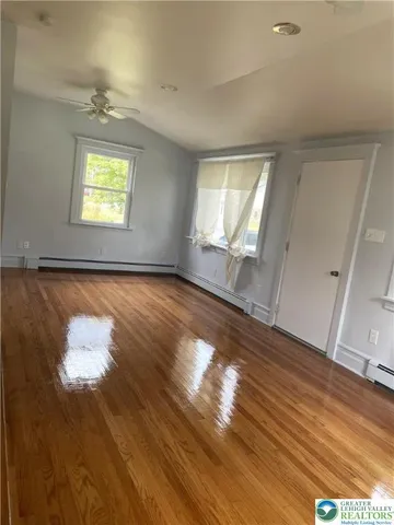 a view of an empty room and window