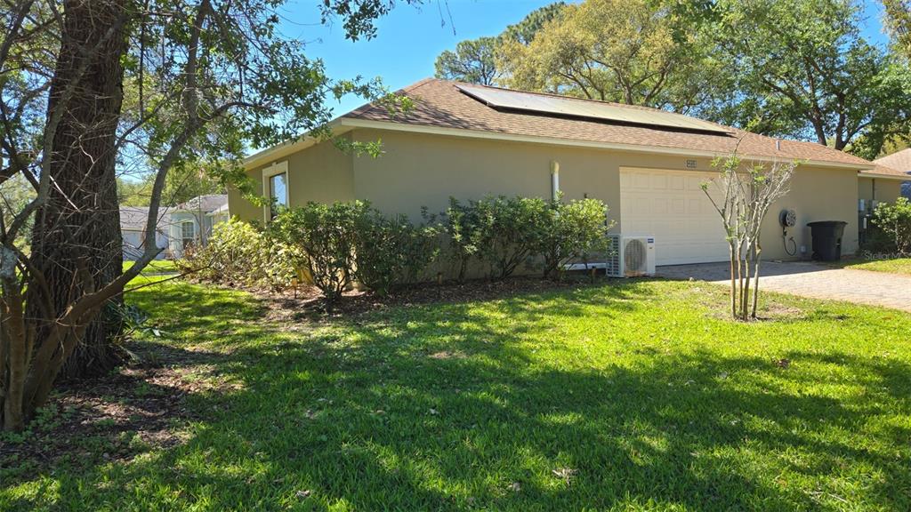 4821 Falcon Boulevard Cocoa, FL 32927 - Photo 40 of 48 a backyard of a house with lots of green space