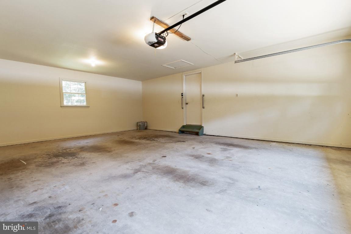 7324 Jenna Road Springfield, VA 22153 - Photo 24 of 64 2-car garage off kitchen: newer garage door