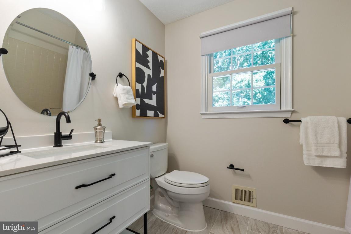 7324 Jenna Road Springfield, VA 22153 - Photo 34 of 64 Updated upper level hall bathroom