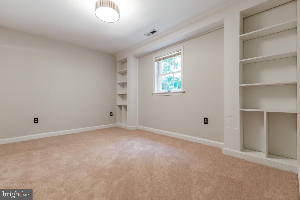7324 Jenna Road Springfield, VA 22153 - Photo 45 of 64 Bedroom 5 lower level with built-ins