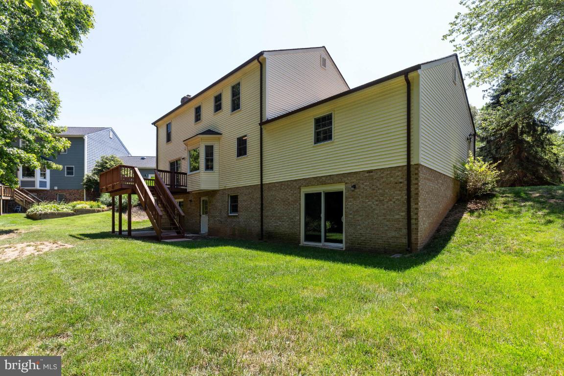 7324 Jenna Road Springfield, VA 22153 - Photo 52 of 64 Rear elevation shows walk out basement doors