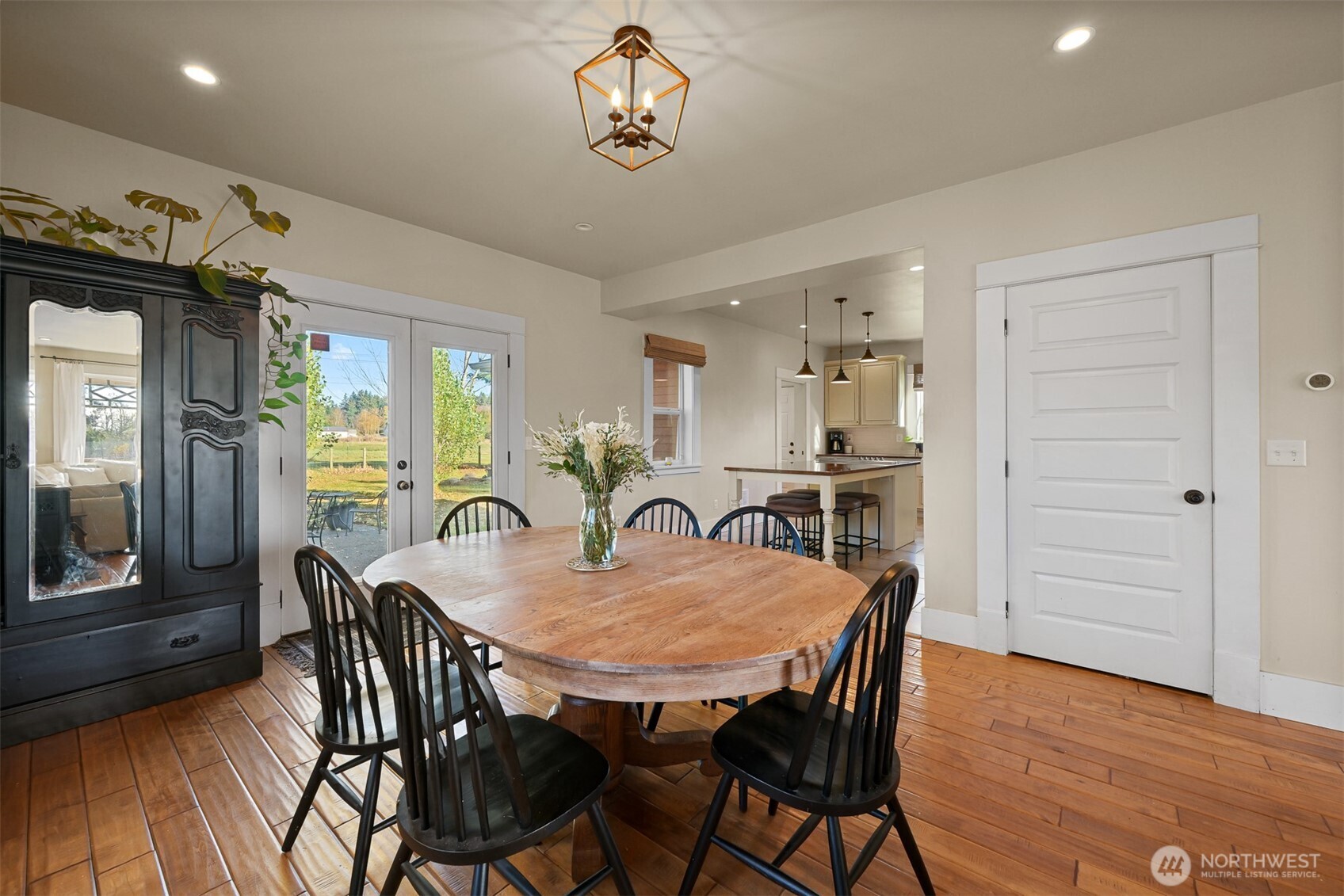 2880 Creasey Road Custer, WA 98240 - Photo 11 of 40 a view of a dining room with furniture window and wooden floor