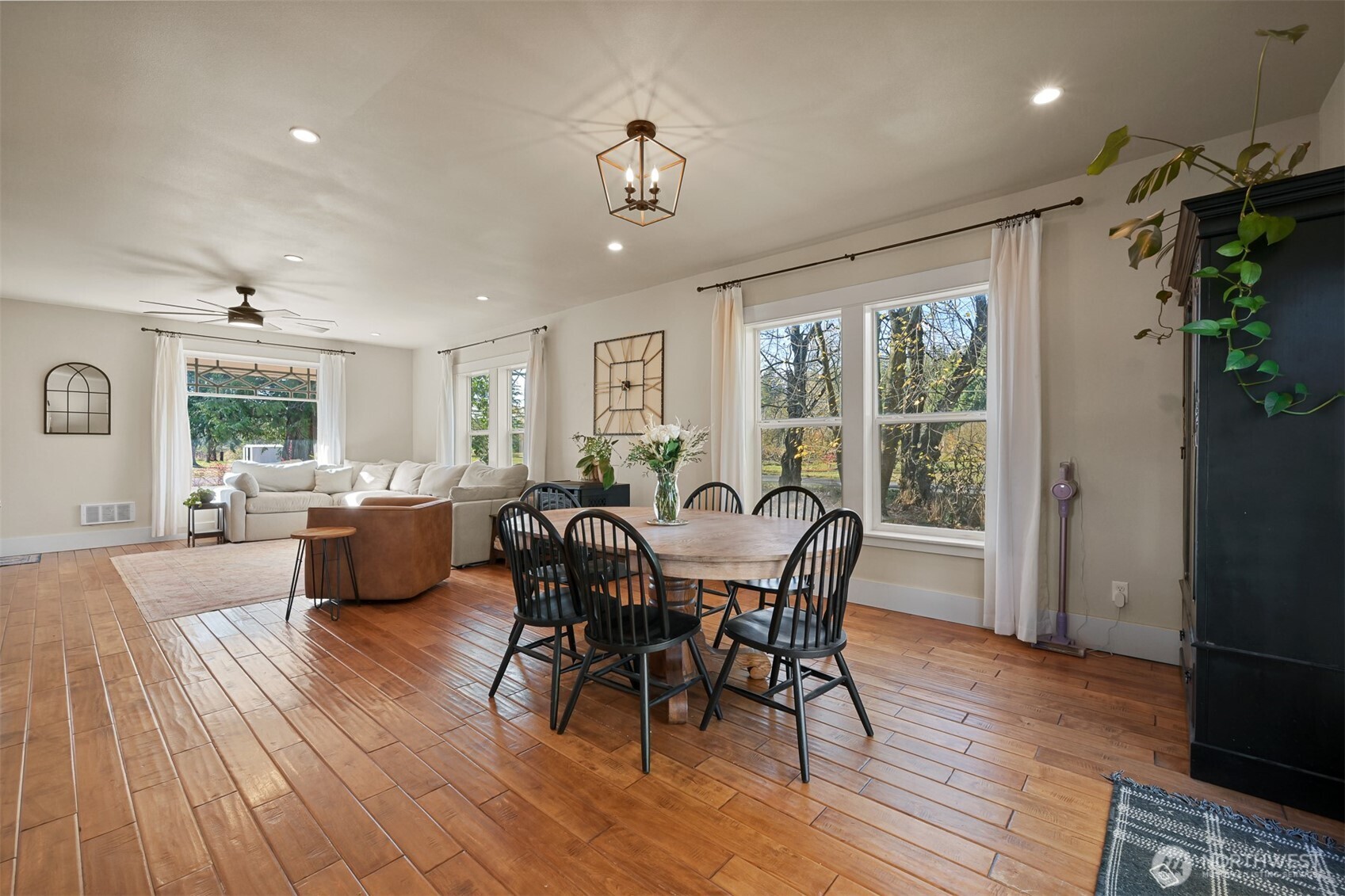2880 Creasey Road Custer, WA 98240 - Photo 13 of 40 a view of a dining room with furniture window and wooden floor