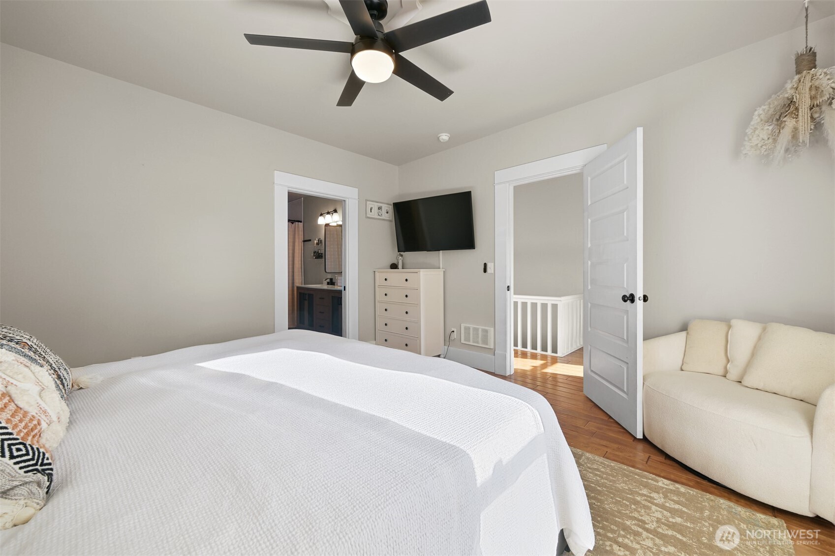 2880 Creasey Road Custer, WA 98240 - Photo 17 of 40 a bedroom with a bed and a flat screen tv