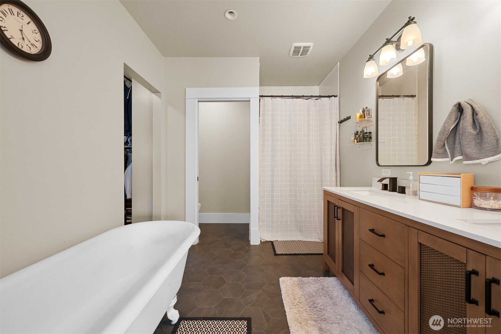 2880 Creasey Road Custer, WA 98240 - Photo 18 of 40 a spacious bathroom with a double vanity sink a mirror and a shower