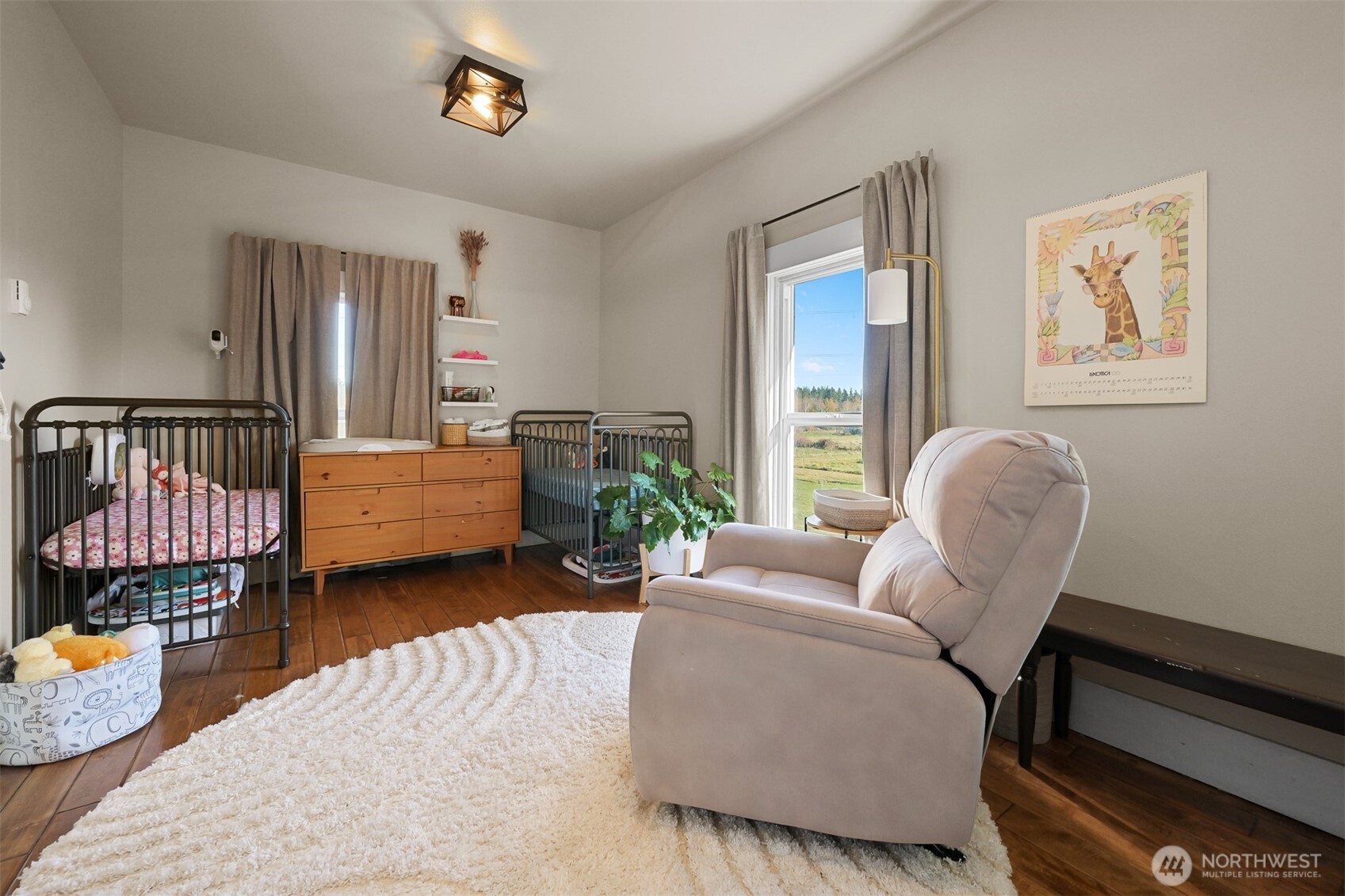 2880 Creasey Road Custer, WA 98240 - Photo 21 of 40 a living room with furniture and wooden floor