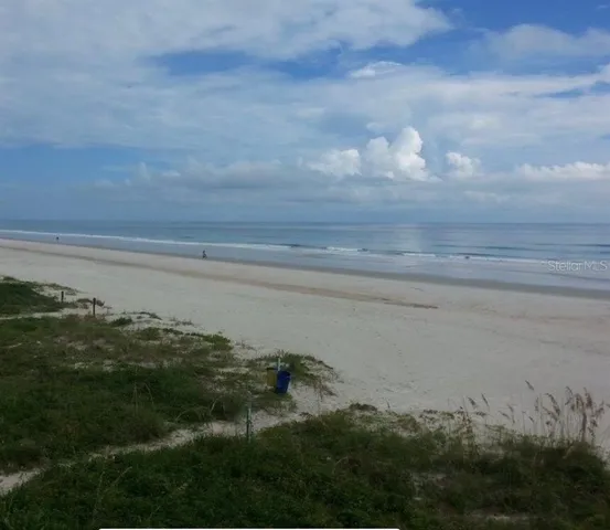 a view of a lake and mountain in the back