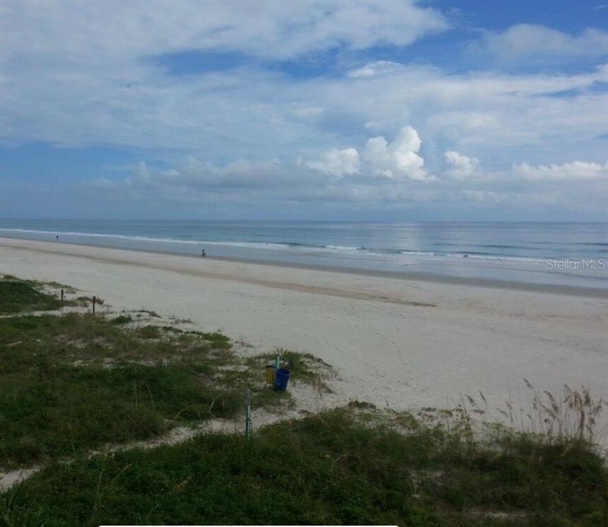 a view of a lake and mountain in the back