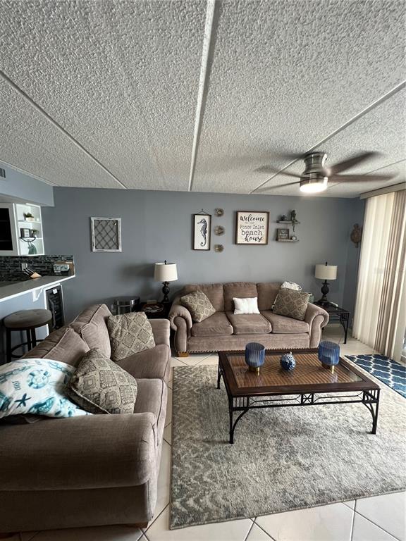4453 South Atlantic Avenue, Unit 208 Ponce Inlet, FL 32127 - Photo 16 of 40 a living room with furniture
