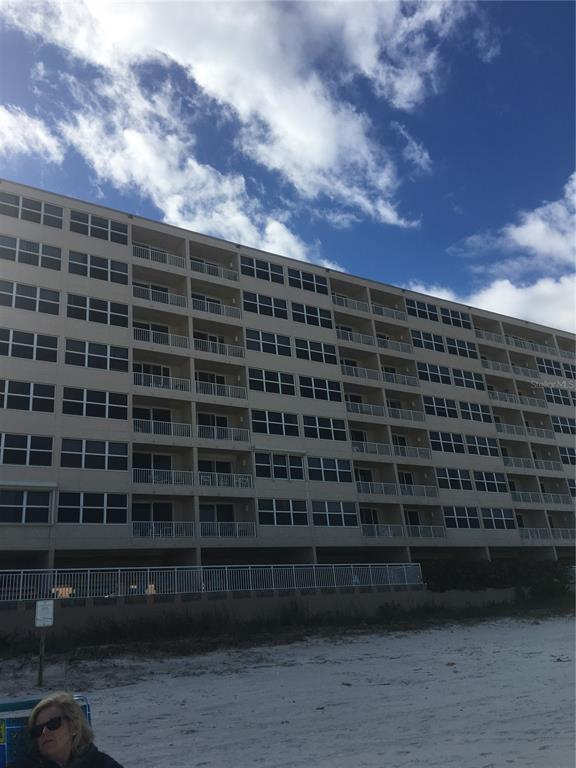 4453 South Atlantic Avenue, Unit 208 Ponce Inlet, FL 32127 - Photo 2 of 40 a view of a city with tall buildings