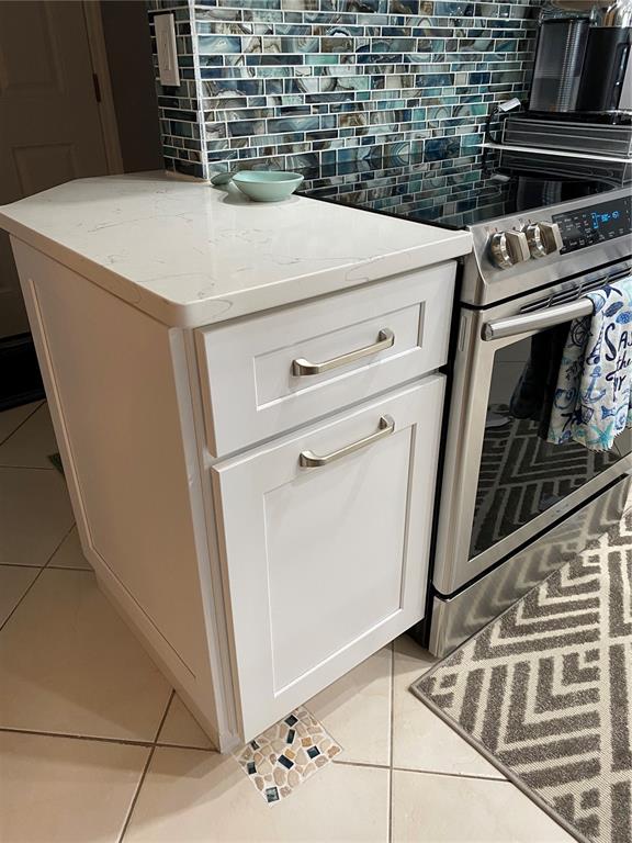 4453 South Atlantic Avenue, Unit 208 Ponce Inlet, FL 32127 - Photo 34 of 40 a close view of washer and dryer