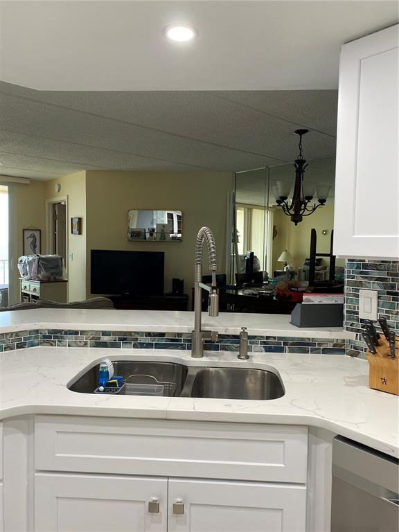 4453 South Atlantic Avenue, Unit 208 Ponce Inlet, FL 32127 - Photo 35 of 40 a view with a sink and a mirror