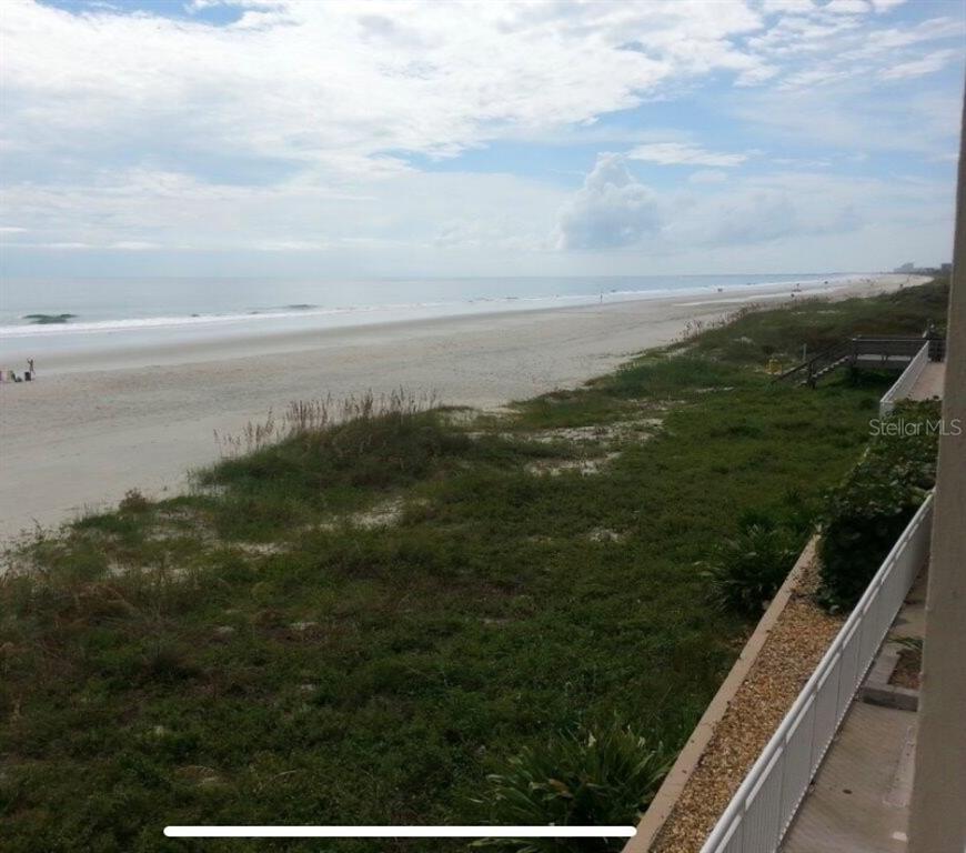 4453 South Atlantic Avenue, Unit 208 Ponce Inlet, FL 32127 - Photo 6 of 40 a view of a lake from a balcony