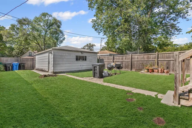 a view of a backyard with a garden
