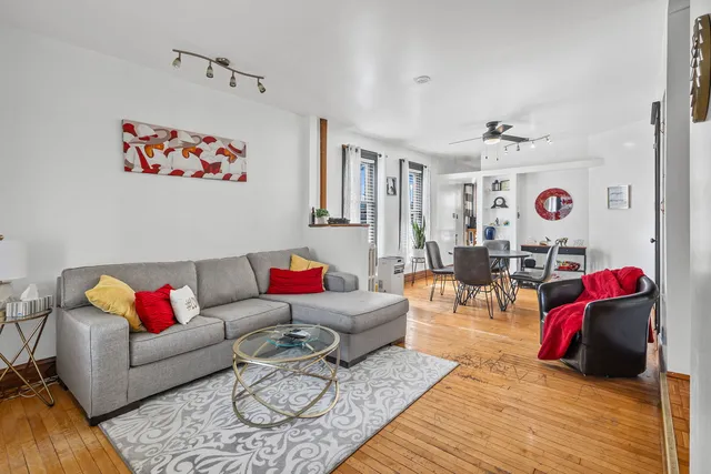 a living room with furniture and a couch