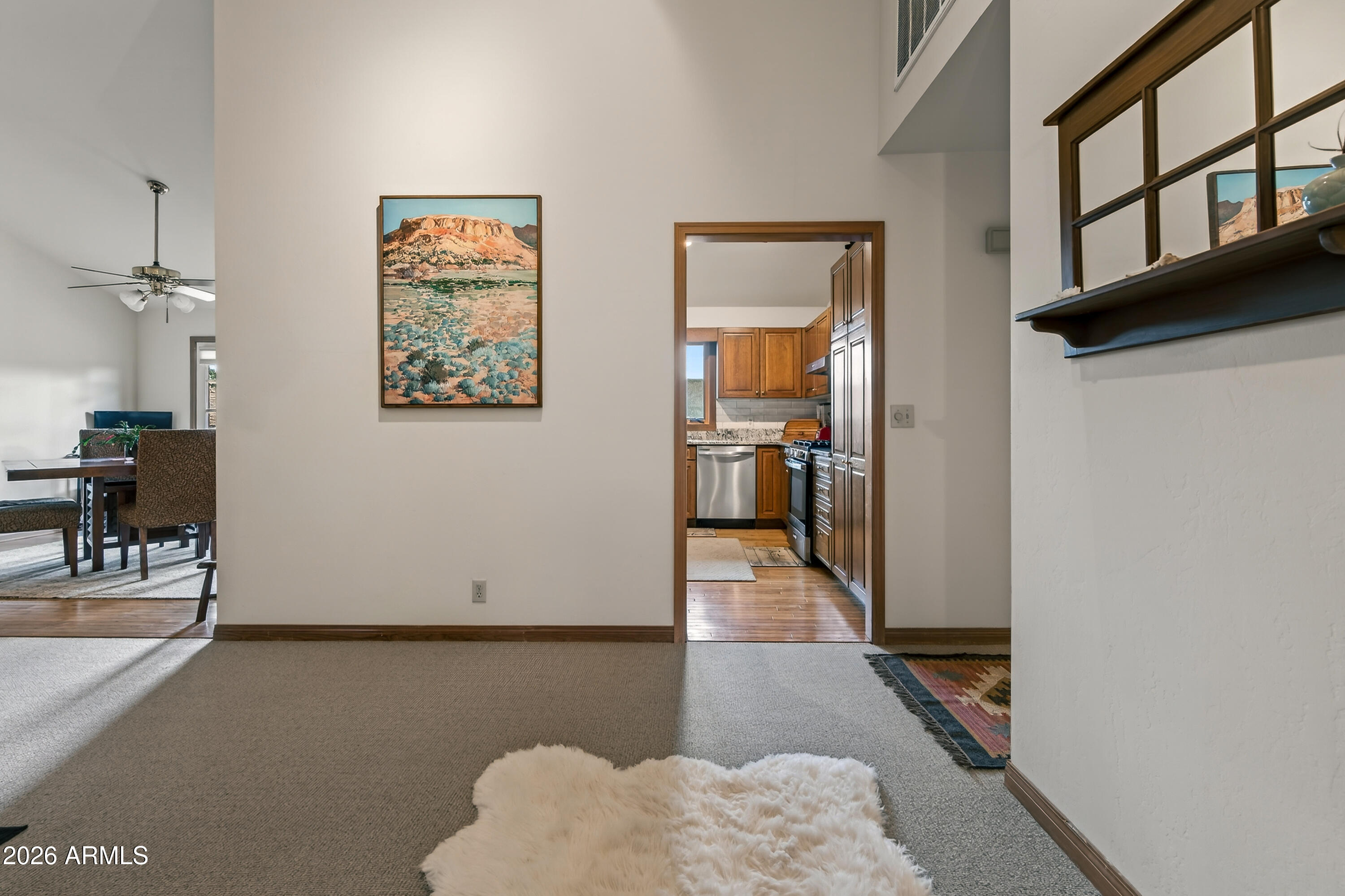 2215 Lariat Road Sedona, AZ 86336 - Photo 11 of 45 a view of a hallway with workspace and a window