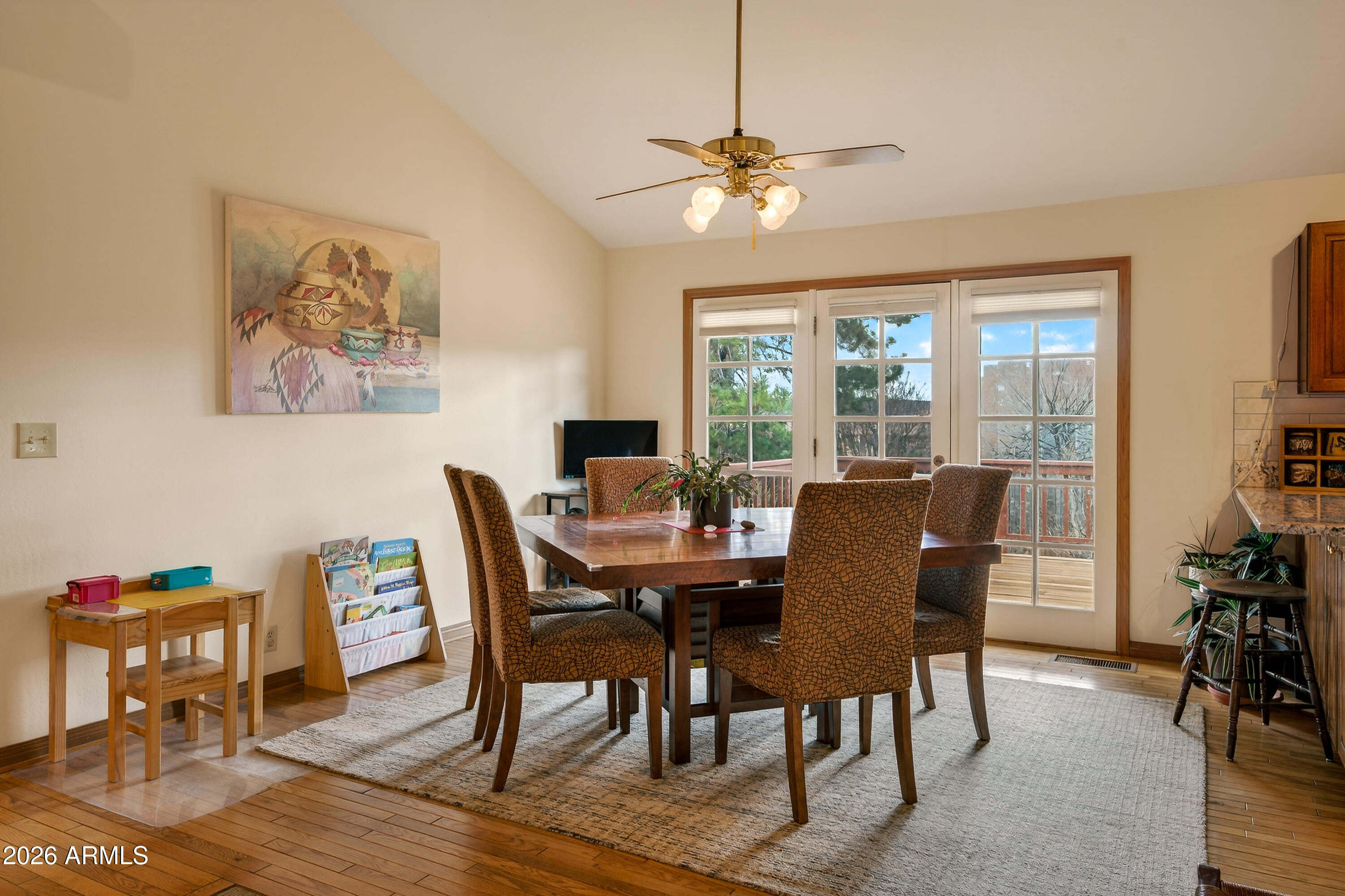 2215 Lariat Road Sedona, AZ 86336 - Photo 18 of 45 a view of a dining room with furniture window and outside view