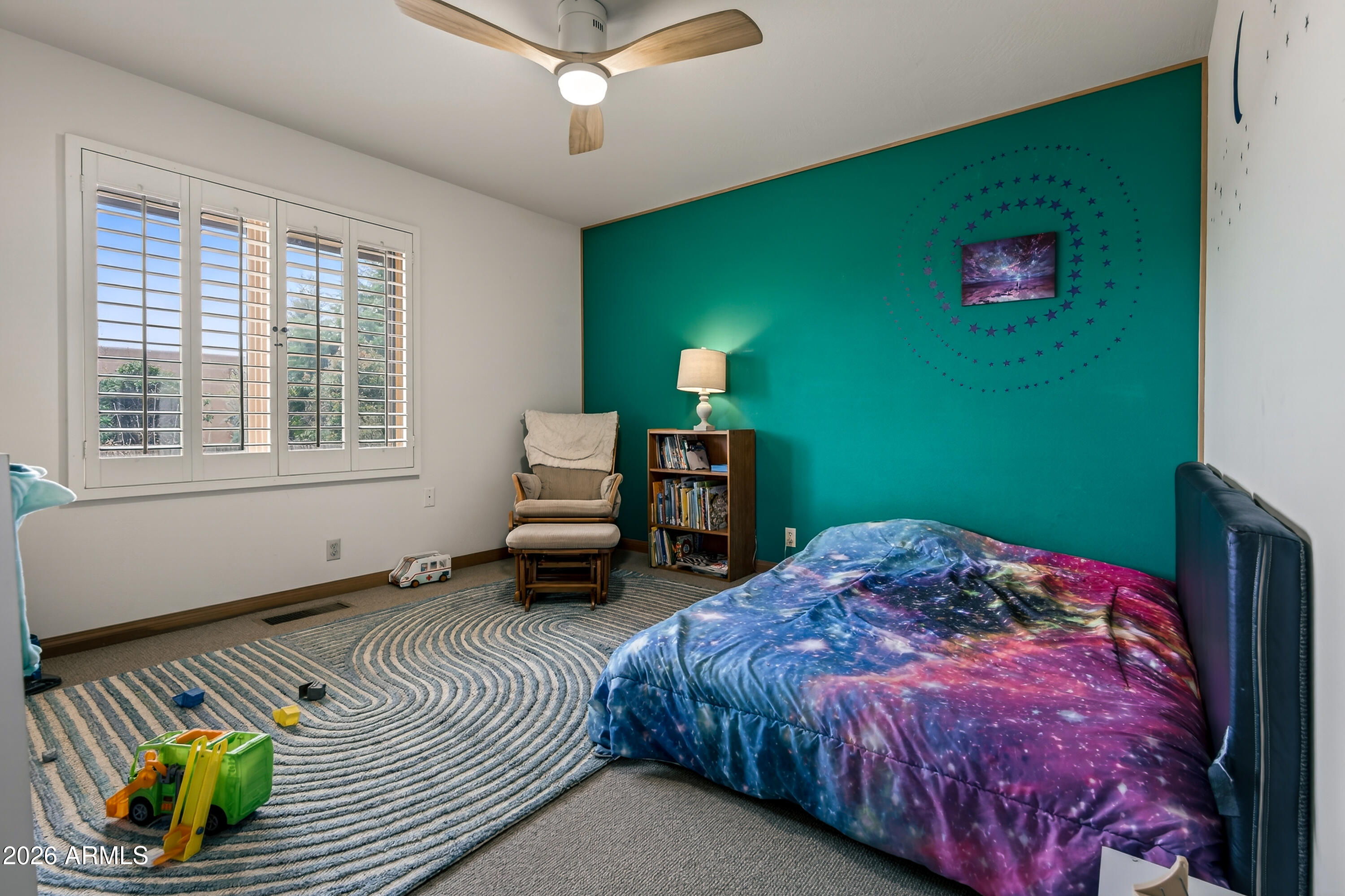 2215 Lariat Road Sedona, AZ 86336 - Photo 29 of 45 a bedroom with a bed and a window