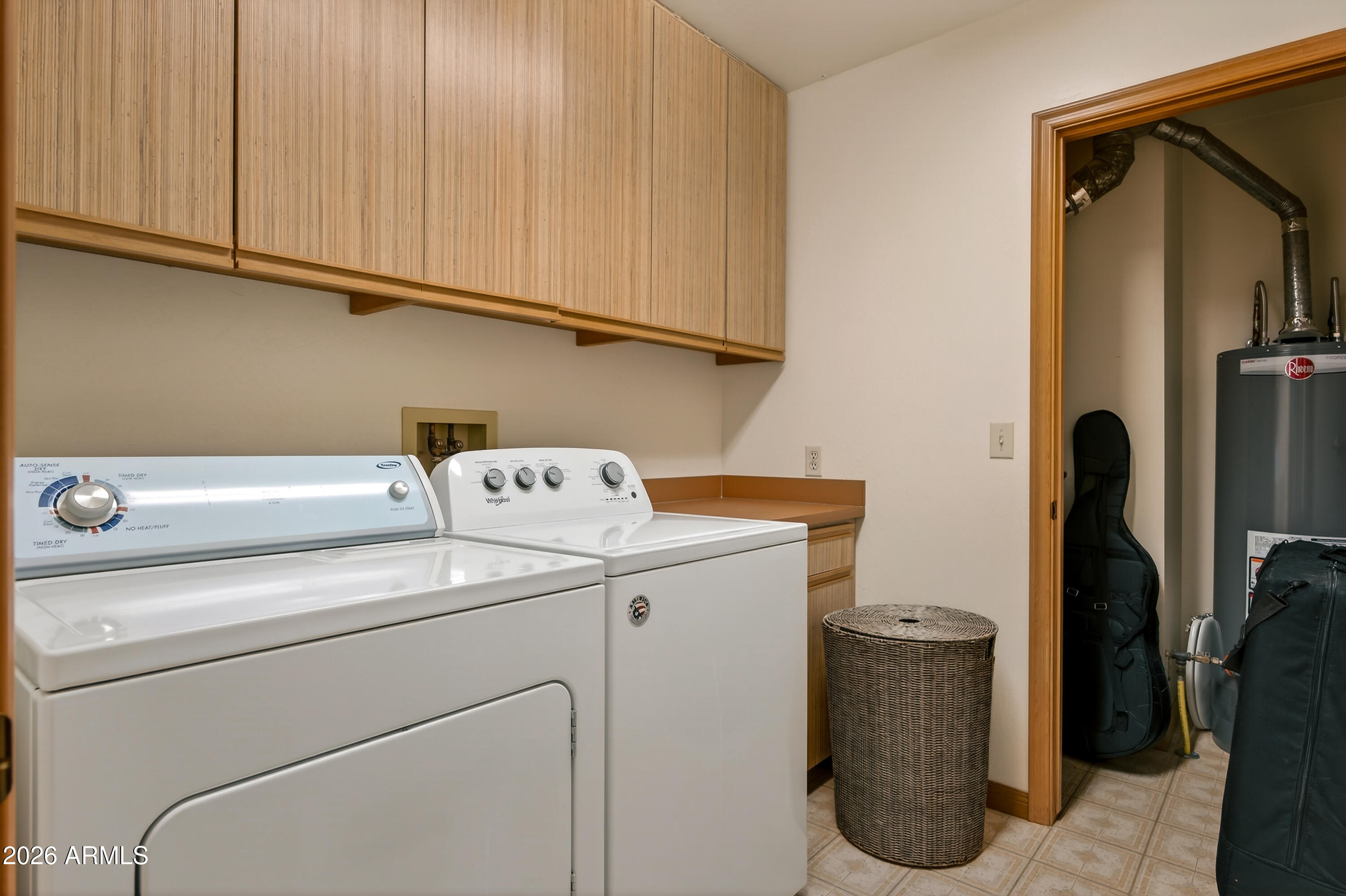 2215 Lariat Road Sedona, AZ 86336 - Photo 30 of 45 a utility room with dryer and washer
