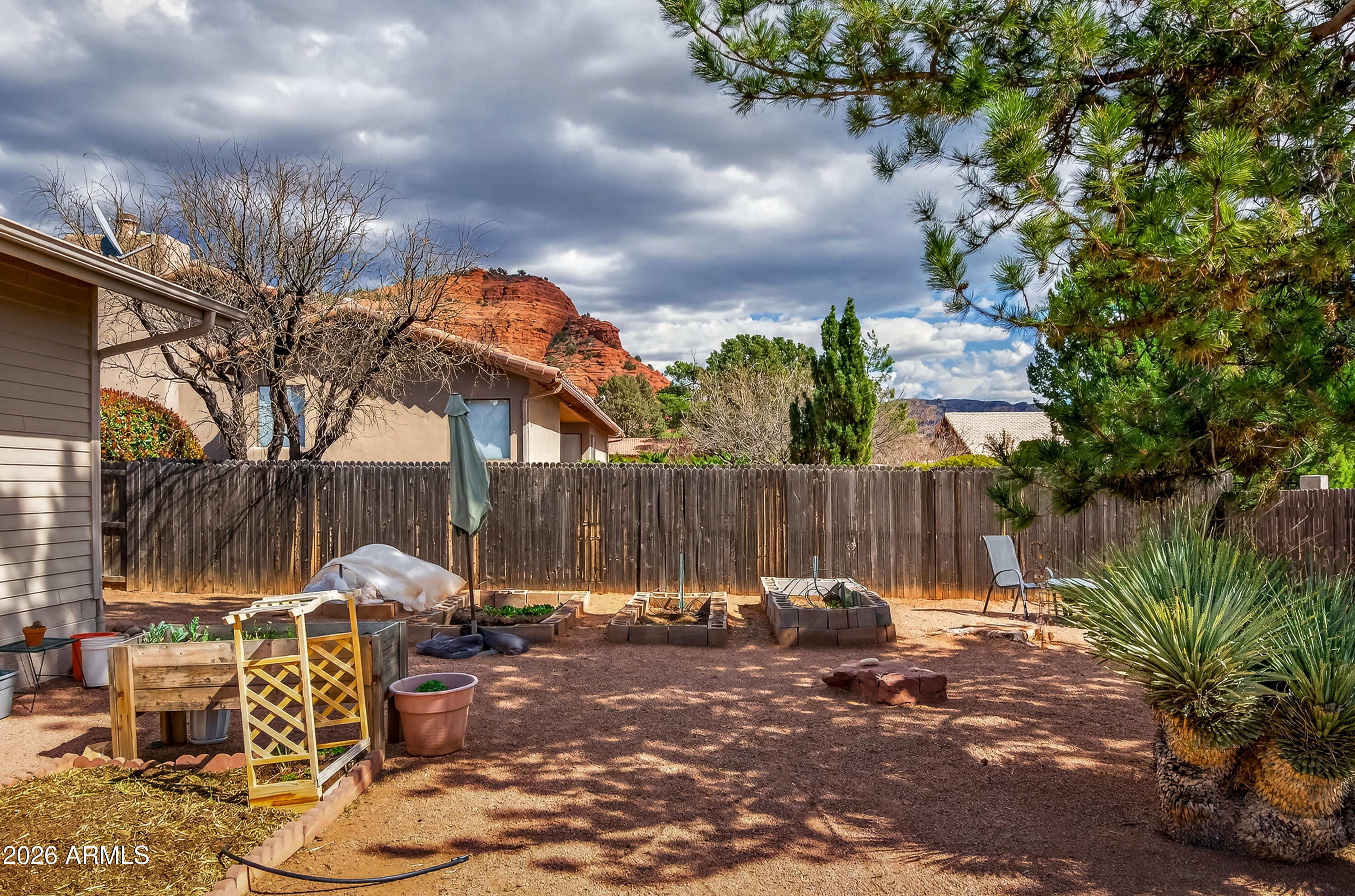 2215 Lariat Road Sedona, AZ 86336 - Photo 39 of 45 a view of a bench in patio
