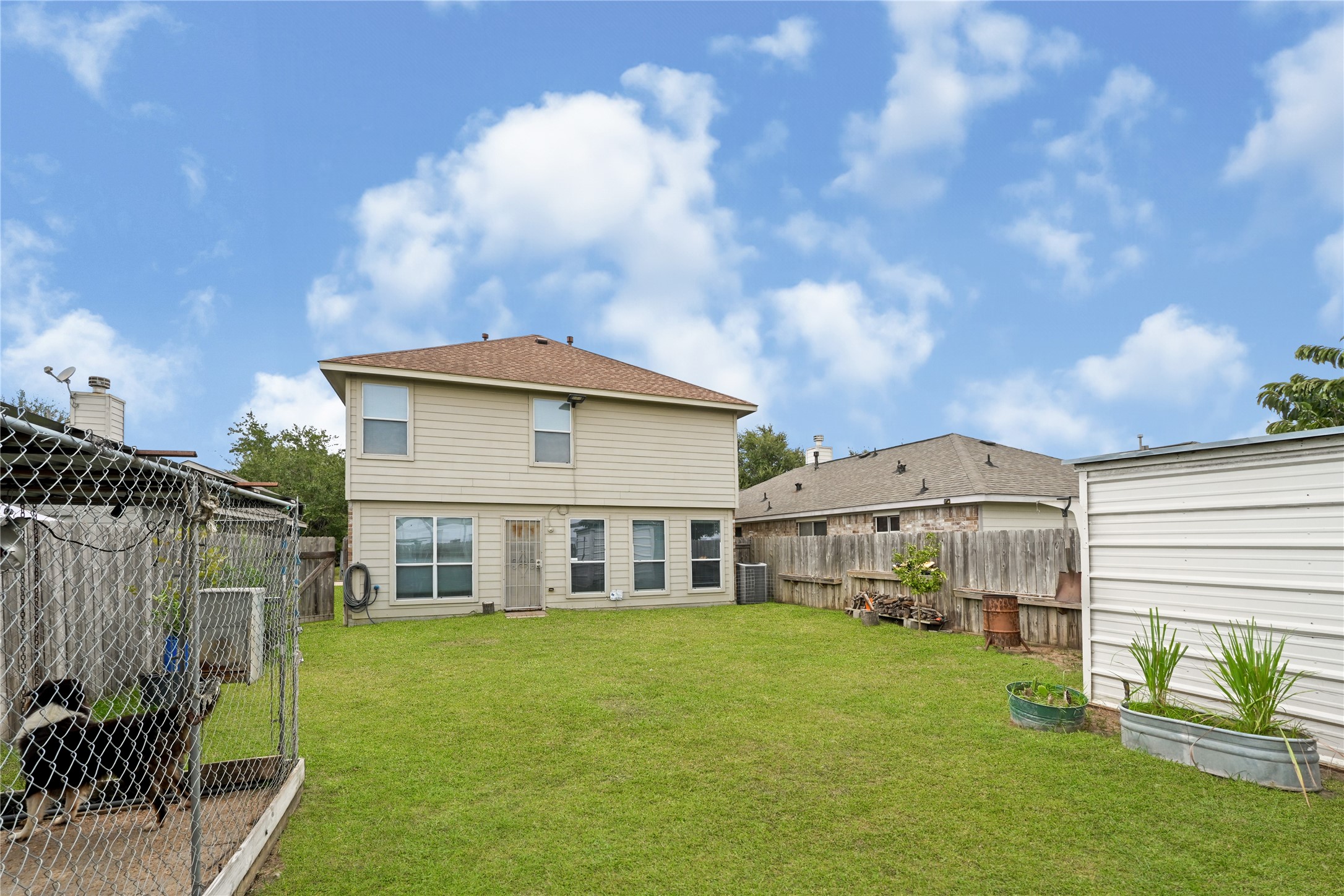 3726 Forney Ridge Lane Houston, TX 77047 - Photo 24 of 25 Spacious fenced backyard with room for outdoor activities.