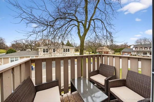 a view of a chairs on the deck