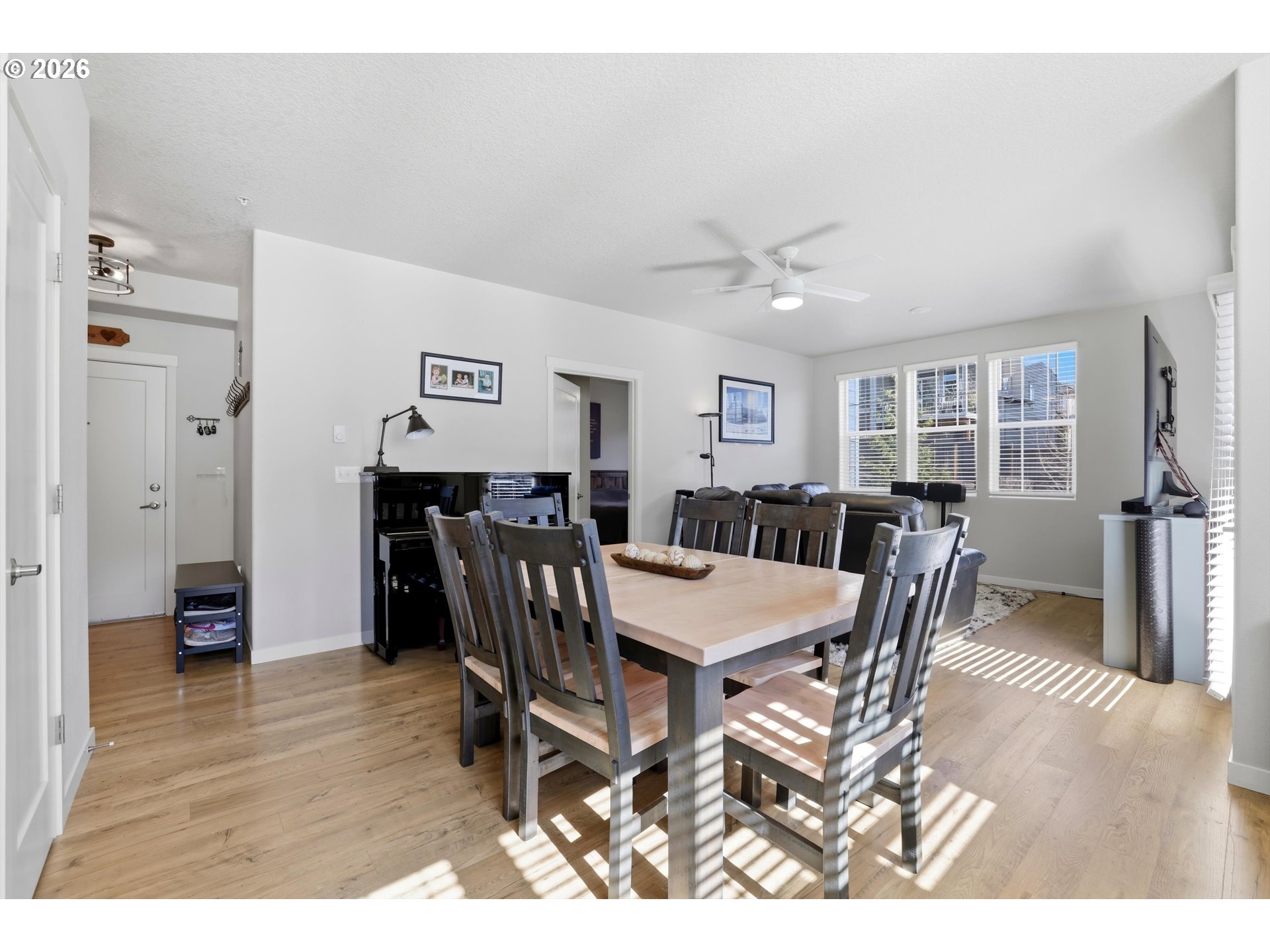 17149 Southwest Snowdale Street, Unit 103 Beaverton, OR 97007 - Photo 14 of 48 a view of a dining room with furniture