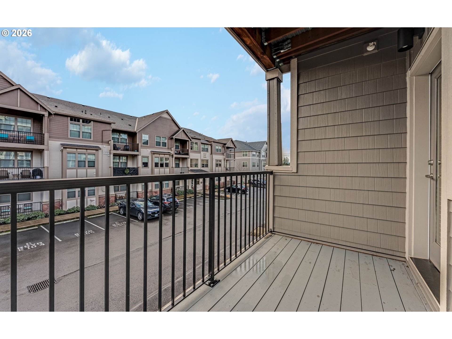 17149 Southwest Snowdale Street, Unit 103 Beaverton, OR 97007 - Photo 18 of 48 a view of city from a balcony
