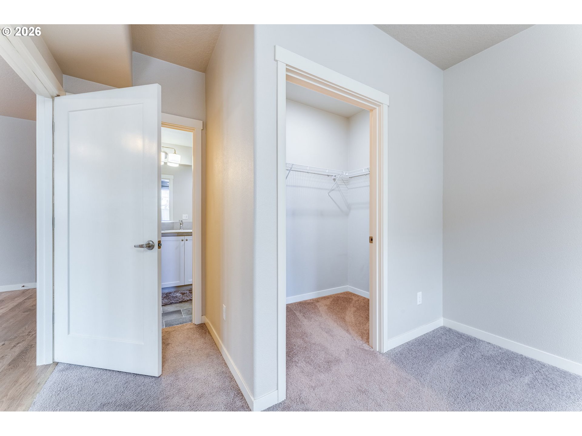 17149 Southwest Snowdale Street, Unit 103 Beaverton, OR 97007 - Photo 26 of 48 a view of a room with a wardrobe space