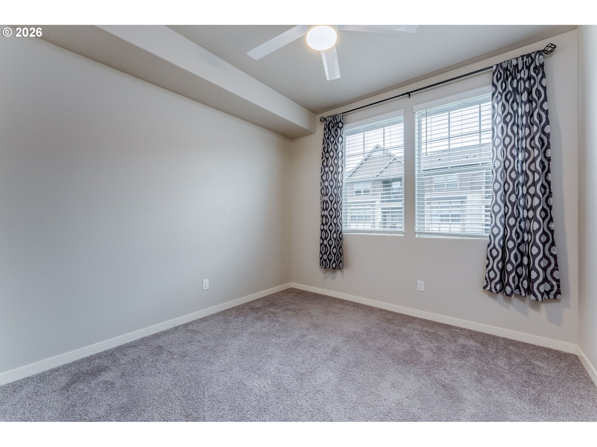 17149 Southwest Snowdale Street, Unit 103 Beaverton, OR 97007 - Photo 31 of 48 a view of an empty room with a window