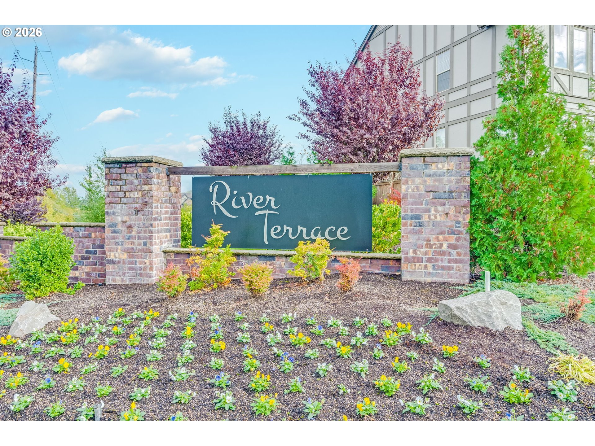 17149 Southwest Snowdale Street, Unit 103 Beaverton, OR 97007 - Photo 40 of 48 a sign board with buildings in the background