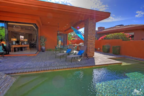 a view of outdoor space yard deck patio and outdoor kitchen