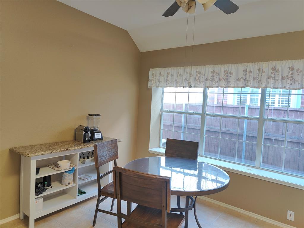 7900 Roaring Ridge Drive Plano, TX 75025 - Photo 20 of 34 a workspace with furniture and window