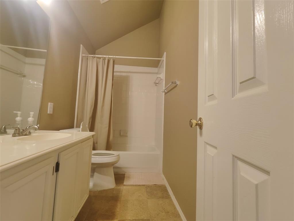 7900 Roaring Ridge Drive Plano, TX 75025 - Photo 30 of 34 a bathroom with a sink a toilet and shower