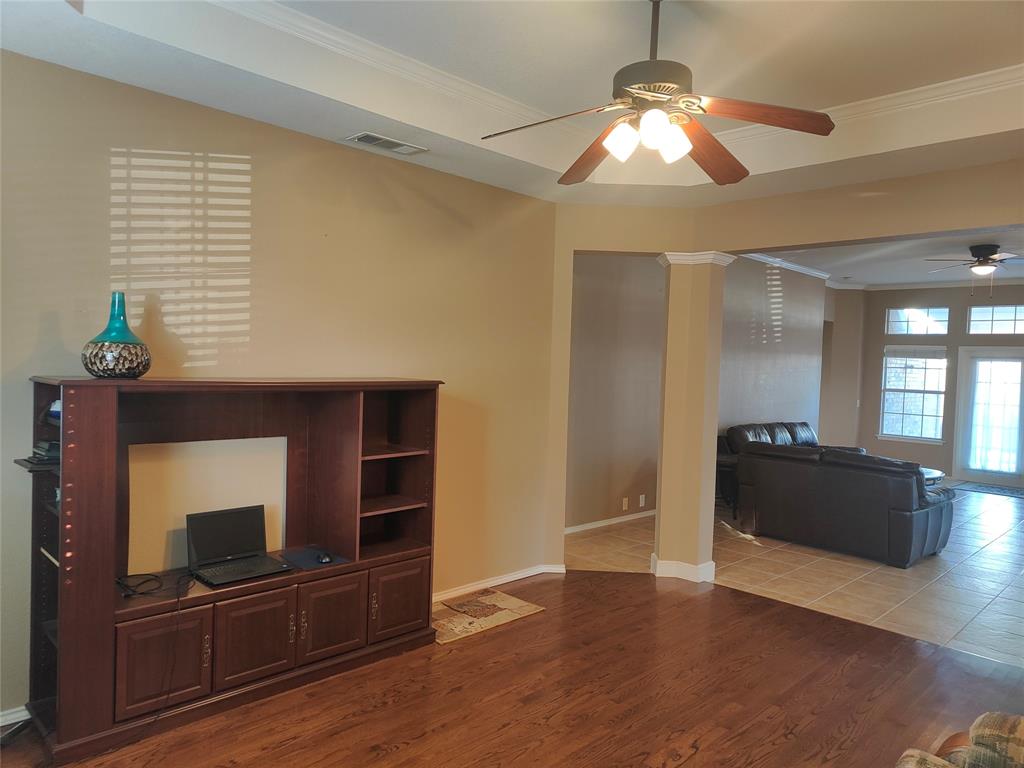 7900 Roaring Ridge Drive Plano, TX 75025 - Photo 5 of 34 a living room with furniture and a flat screen tv
