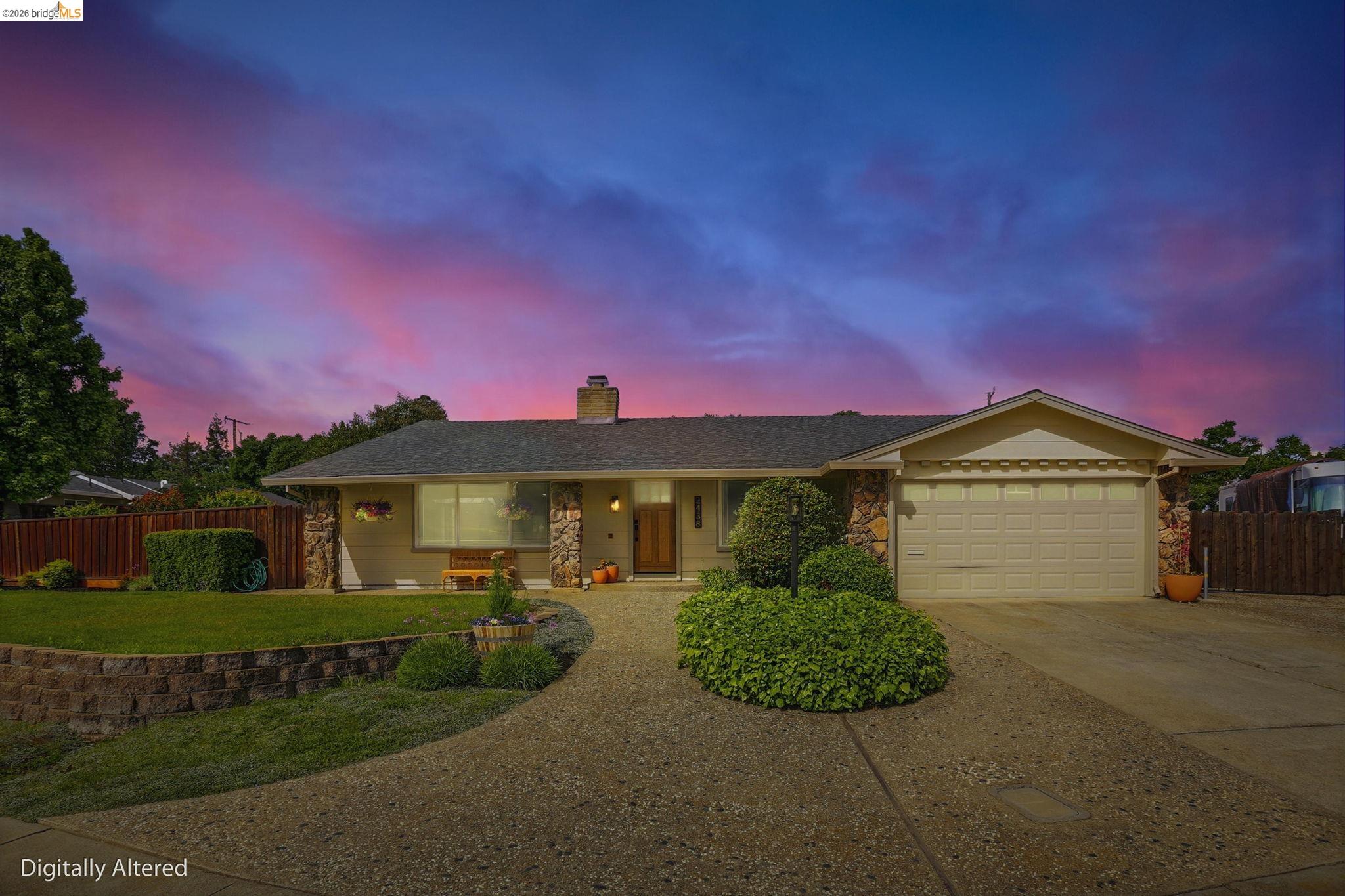 2438 Merritt Place Livermore, CA 94550 - Photo 1 of 64 a front view of a house with a garden