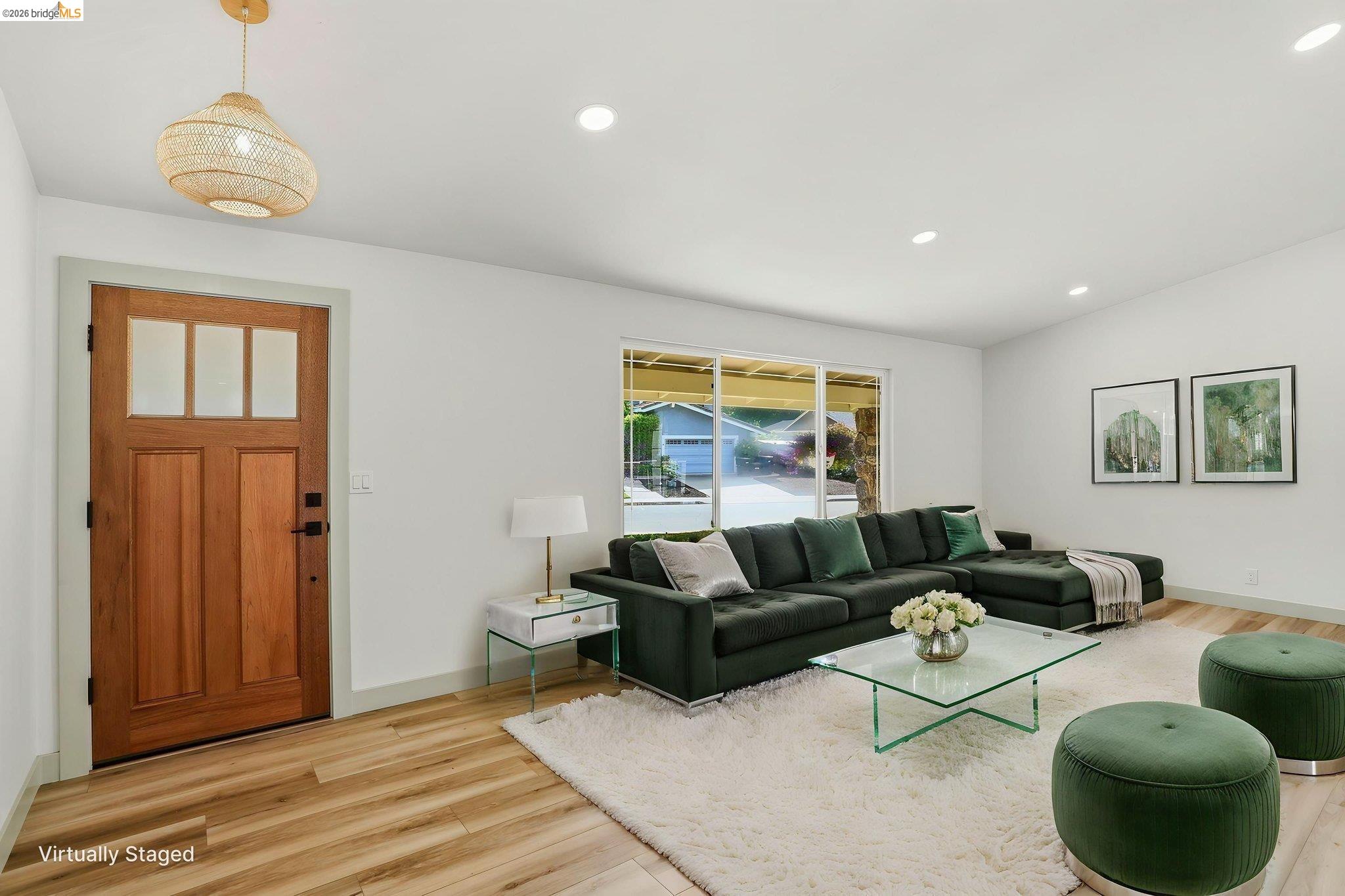 2438 Merritt Place Livermore, CA 94550 - Photo 12 of 64 a living room with furniture and a wooden floor