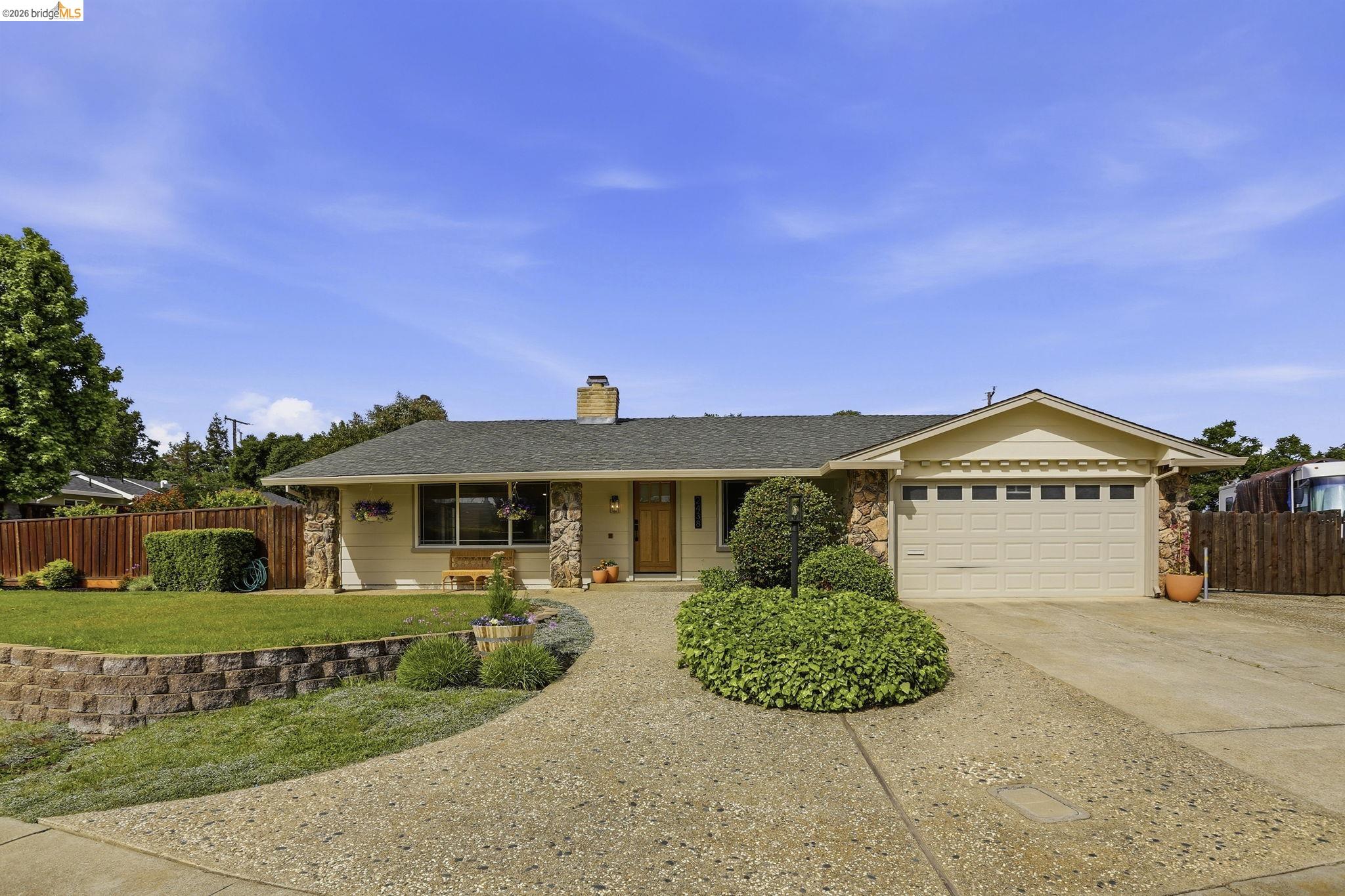 2438 Merritt Place Livermore, CA 94550 - Photo 2 of 64 a front view of a house with a yard