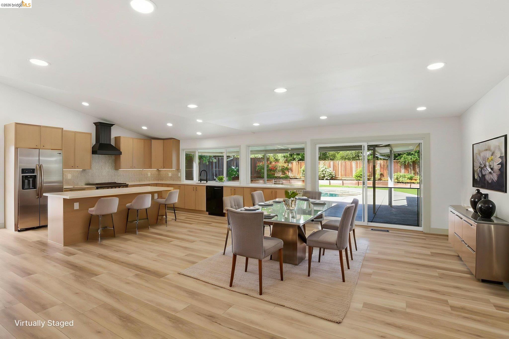 2438 Merritt Place Livermore, CA 94550 - Photo 21 of 64 a view of a dining room with furniture windows and wooden floor