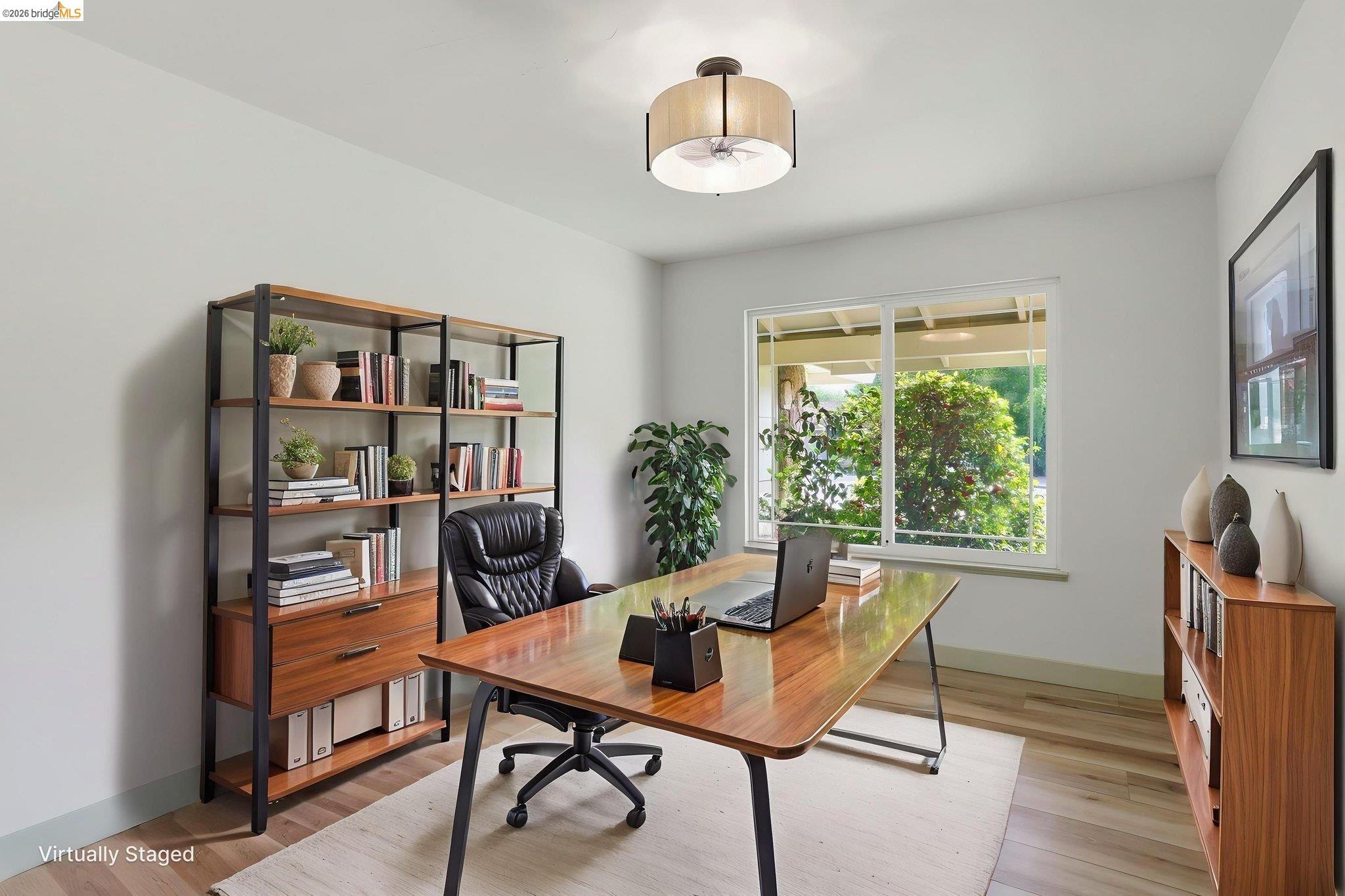2438 Merritt Place Livermore, CA 94550 - Photo 24 of 64 a view of a workspace with furniture and a window