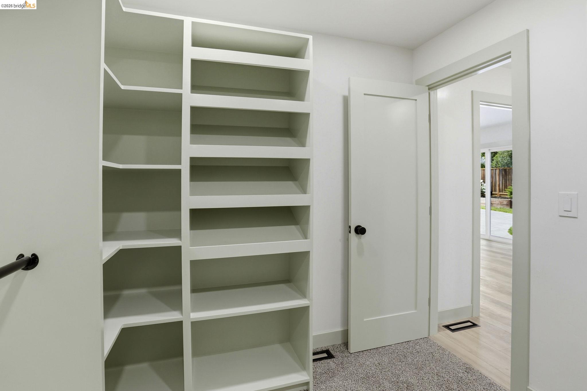 2438 Merritt Place Livermore, CA 94550 - Photo 35 of 64 a view of walk in closet with empty racks
