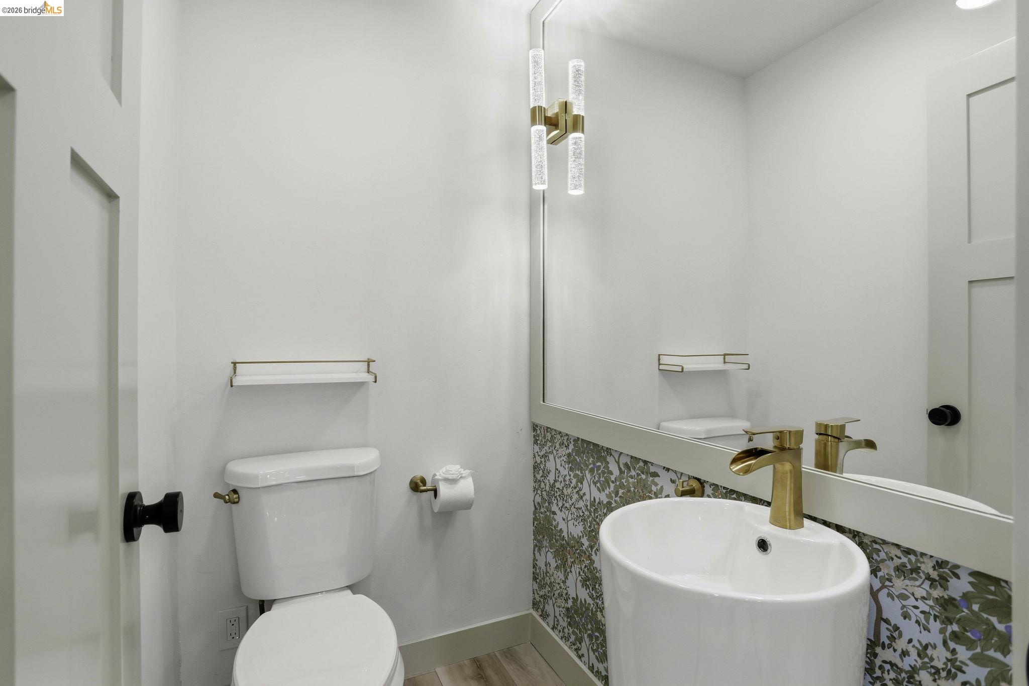 2438 Merritt Place Livermore, CA 94550 - Photo 37 of 64 a bathroom with a sink a toilet and shower