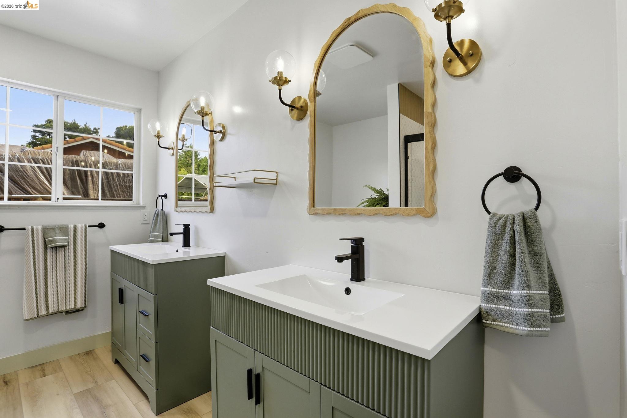 2438 Merritt Place Livermore, CA 94550 - Photo 38 of 64 Bathroom with two vanities and light wood finished floors