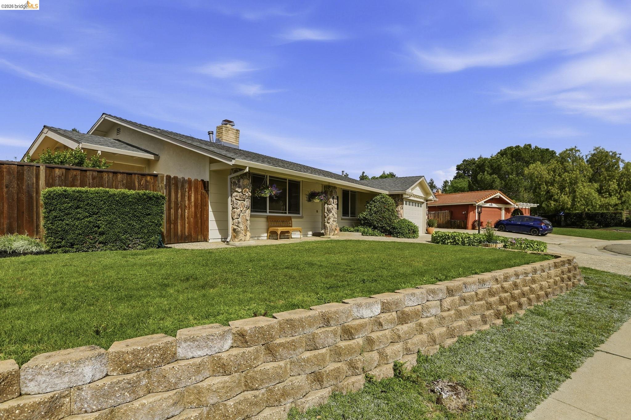 2438 Merritt Place Livermore, CA 94550 - Photo 4 of 64 a front view of a house with a yard