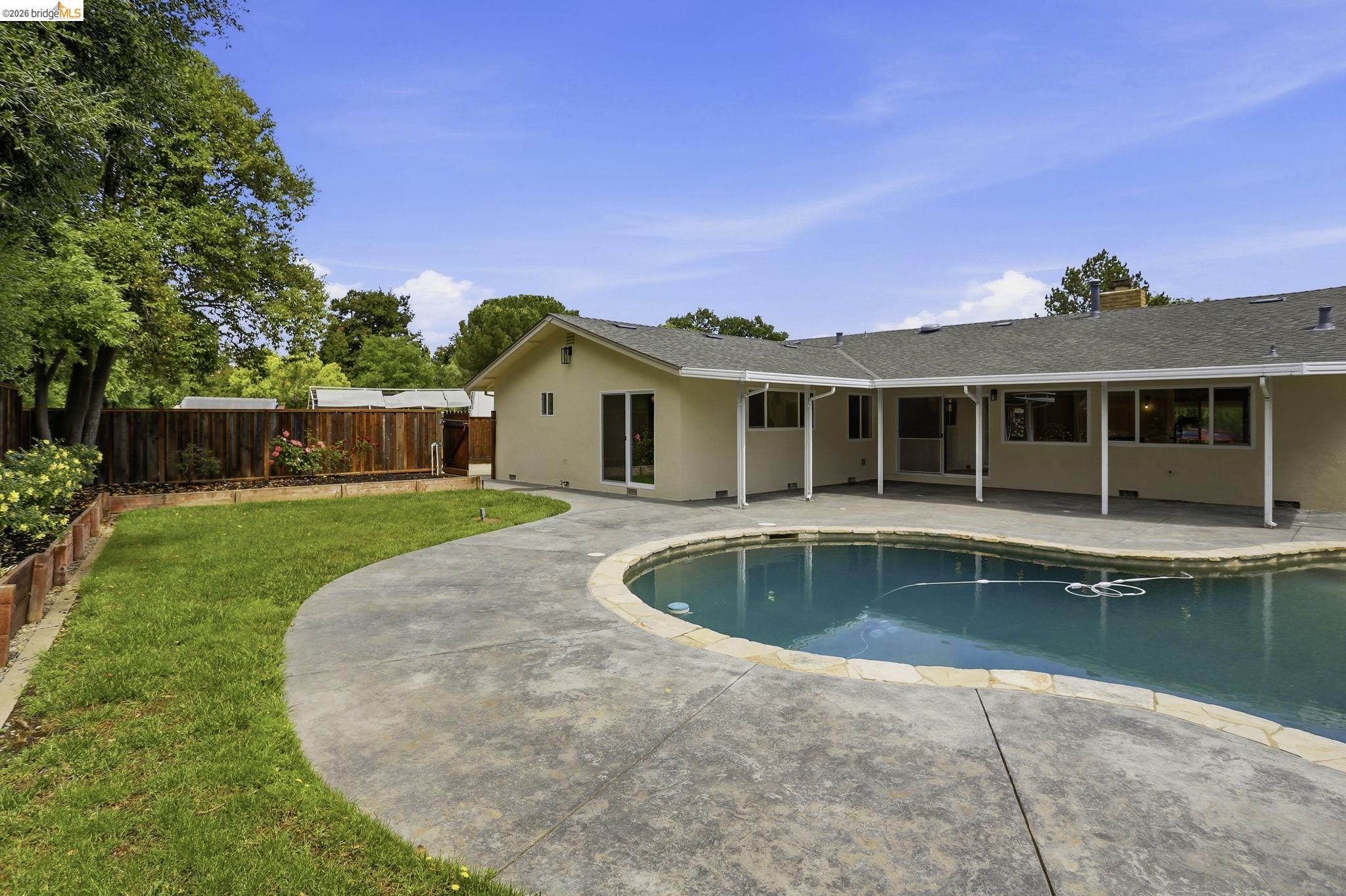 2438 Merritt Place Livermore, CA 94550 - Photo 53 of 64 a view of outdoor space yard swimming pool and porch