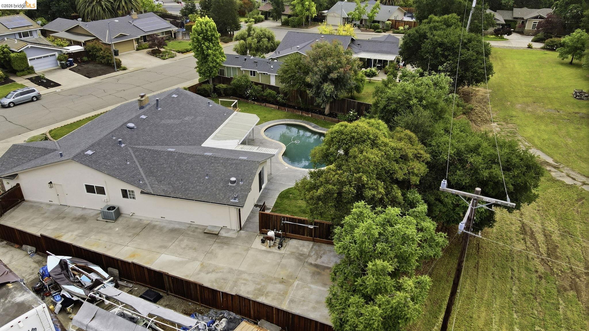 2438 Merritt Place Livermore, CA 94550 - Photo 55 of 64 an aerial view of a house with a yard basket ball court and outdoor seating