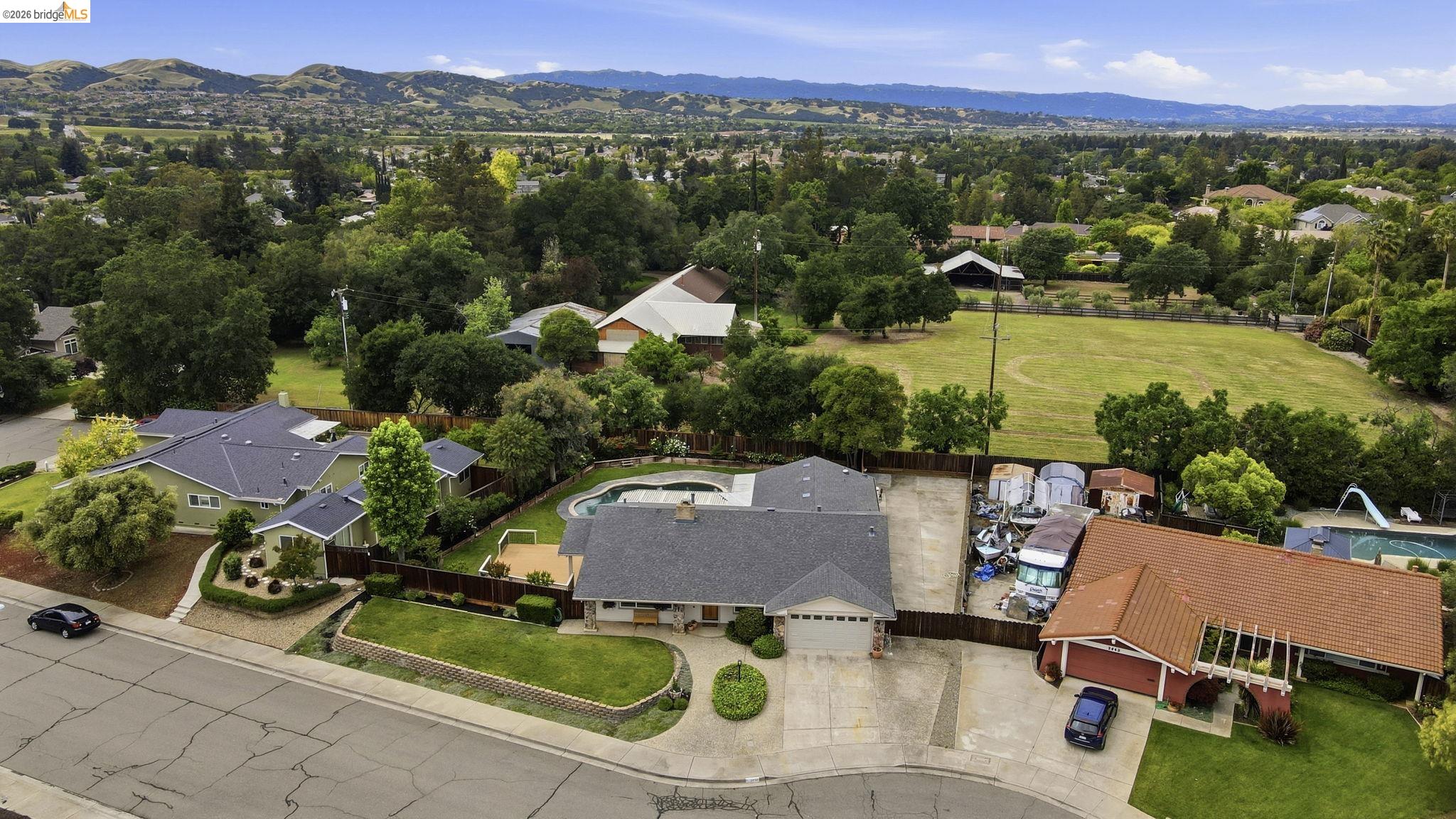 2438 Merritt Place Livermore, CA 94550 - Photo 59 of 64 an aerial view of residential houses with outdoor space and river