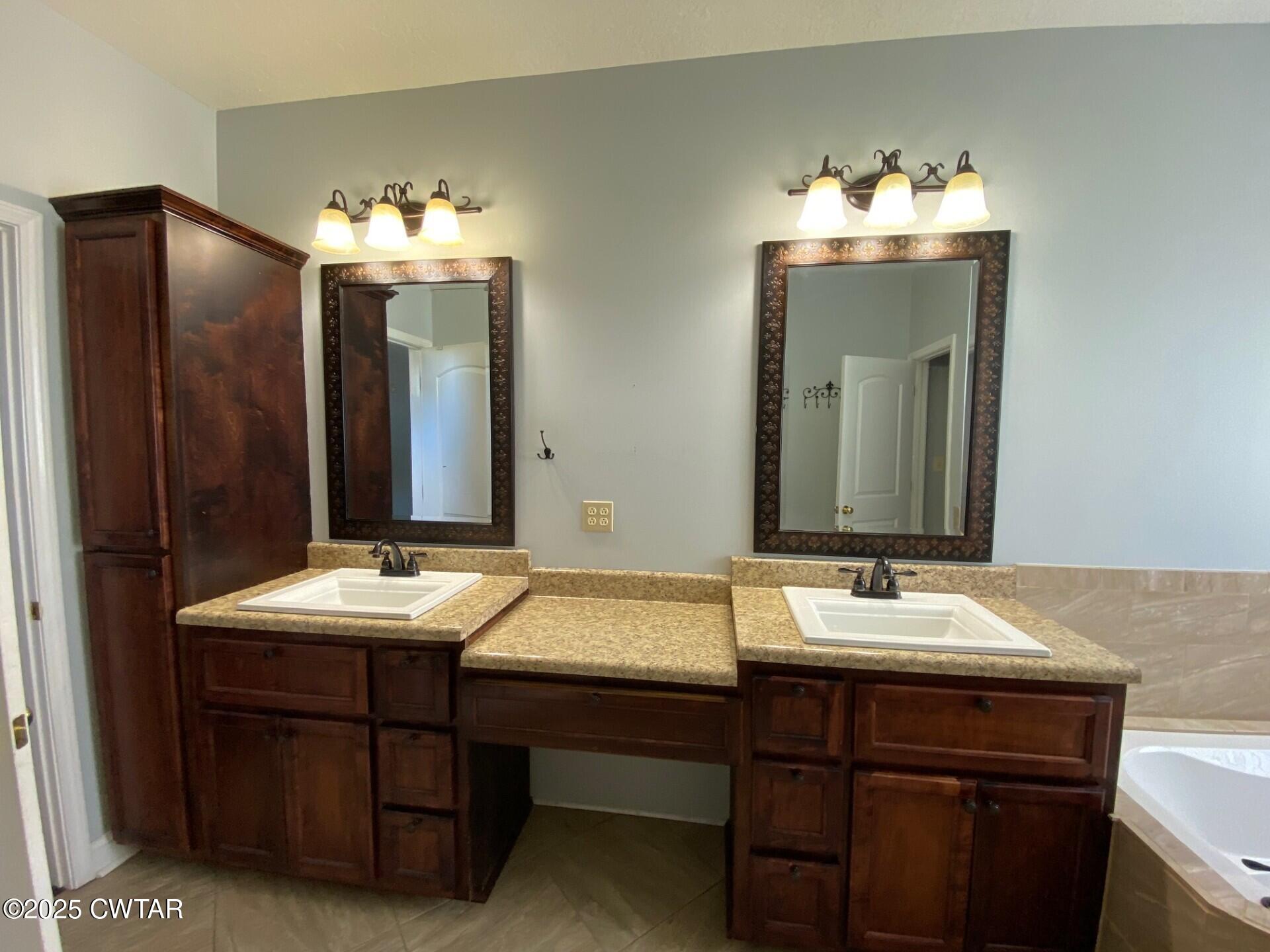 215 Jamie Lane Ridgely, TN 38080 - Photo 15 of 28 Jamie Lane master bath vanities