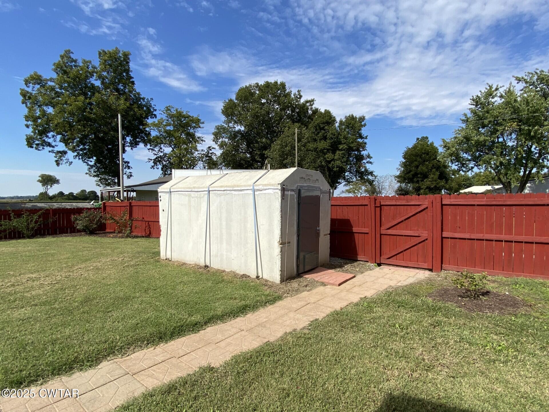 215 Jamie Lane Ridgely, TN 38080 - Photo 22 of 28 Jamie Lane storm shelter